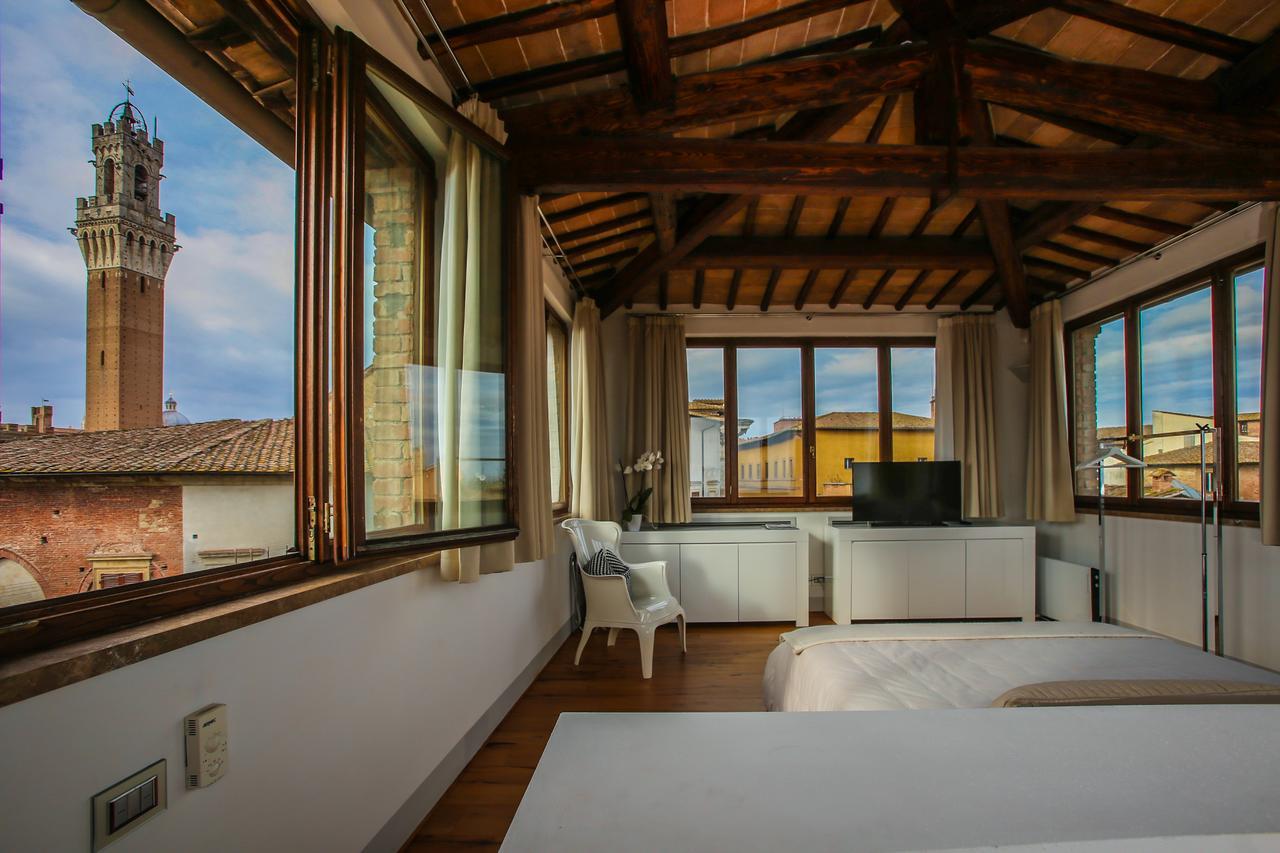 סיינה B&B Le Logge Luxury Rooms מראה חיצוני תמונה